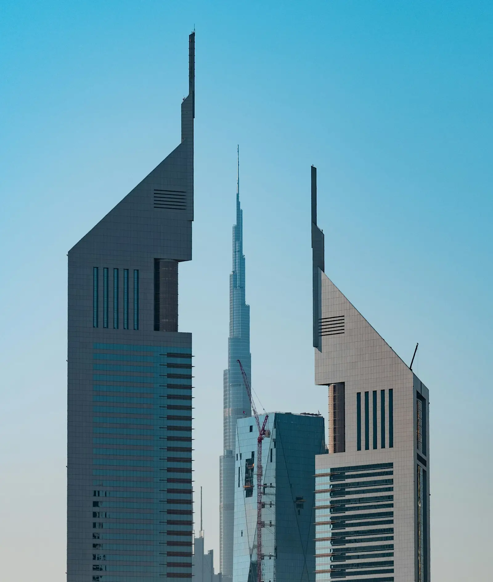 Office towers in Dubai against a blue sky
