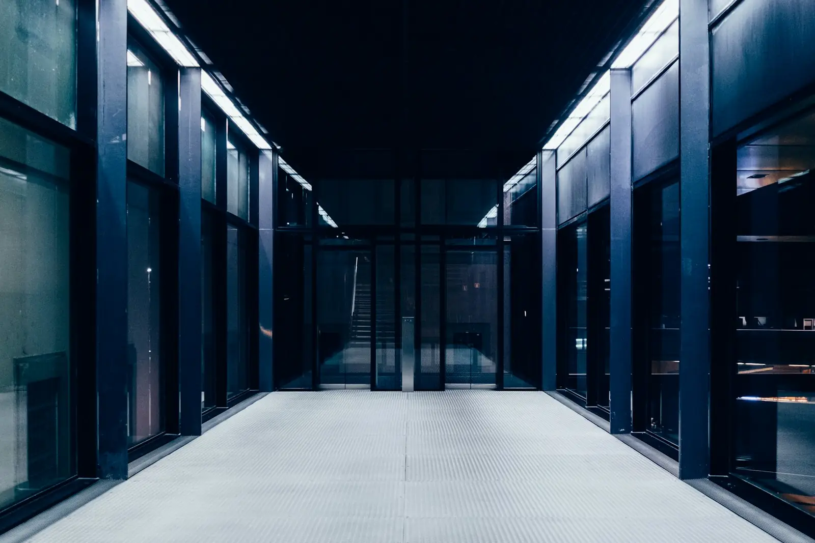 A corridor between server racks in a data centre